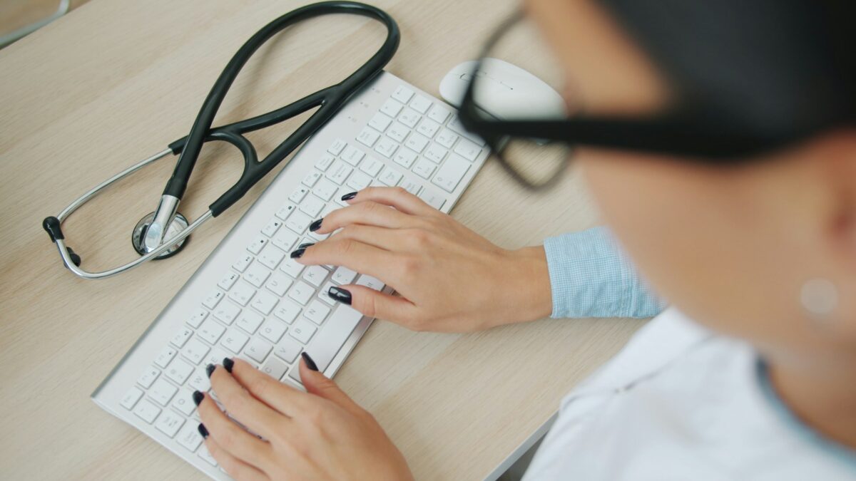 Distributor reviewing non-invasive aesthetic device portfolio growth data